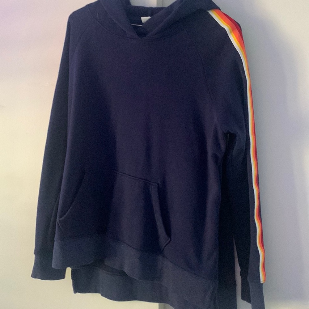 Navy blue sweatshirt with red, pink, orange, yellow, and white stripes on sides